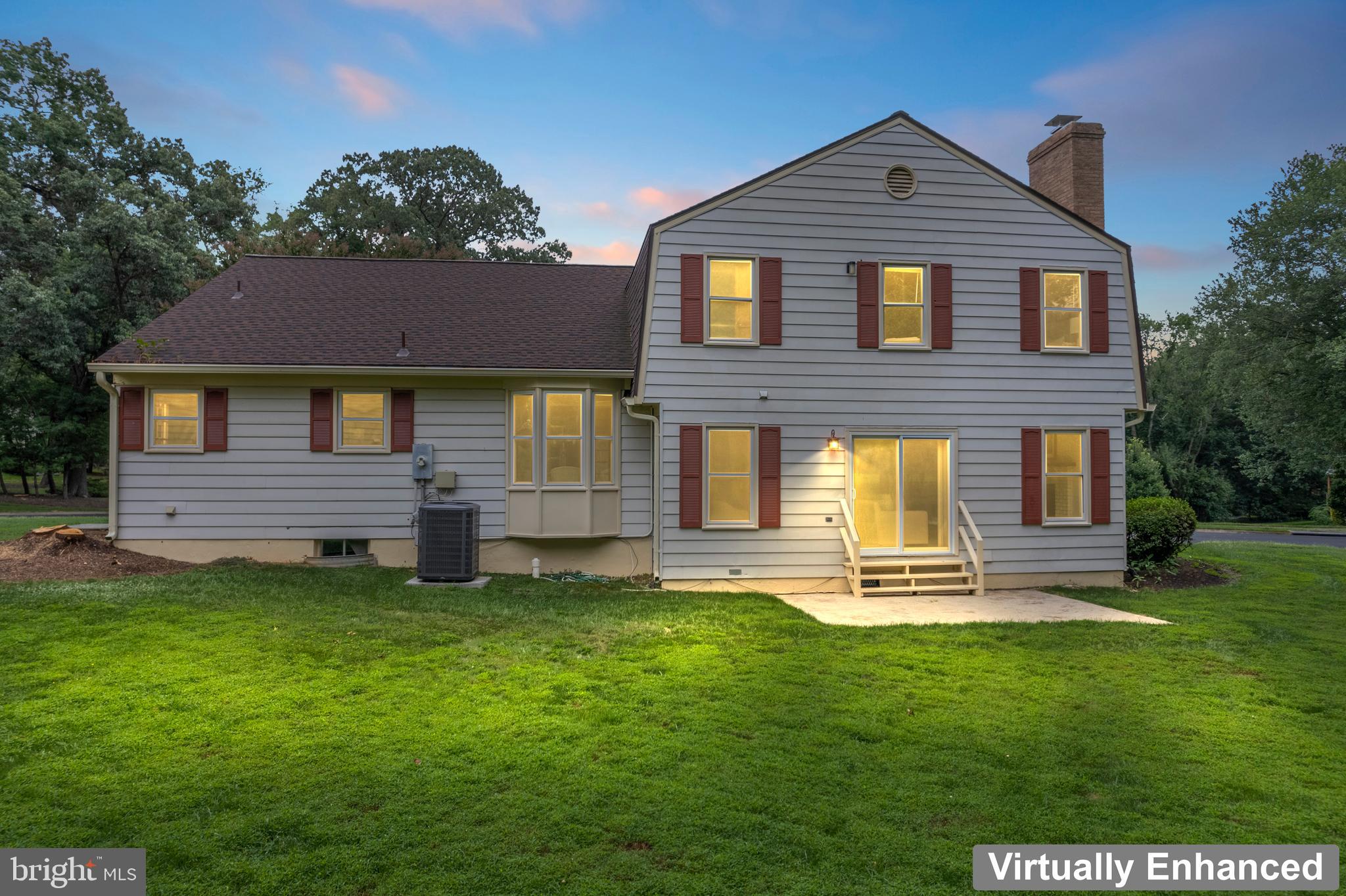 1950 Weybridge Lane Reston, VA 20191 - Photo 2 of 71 a front view of a house with a yard