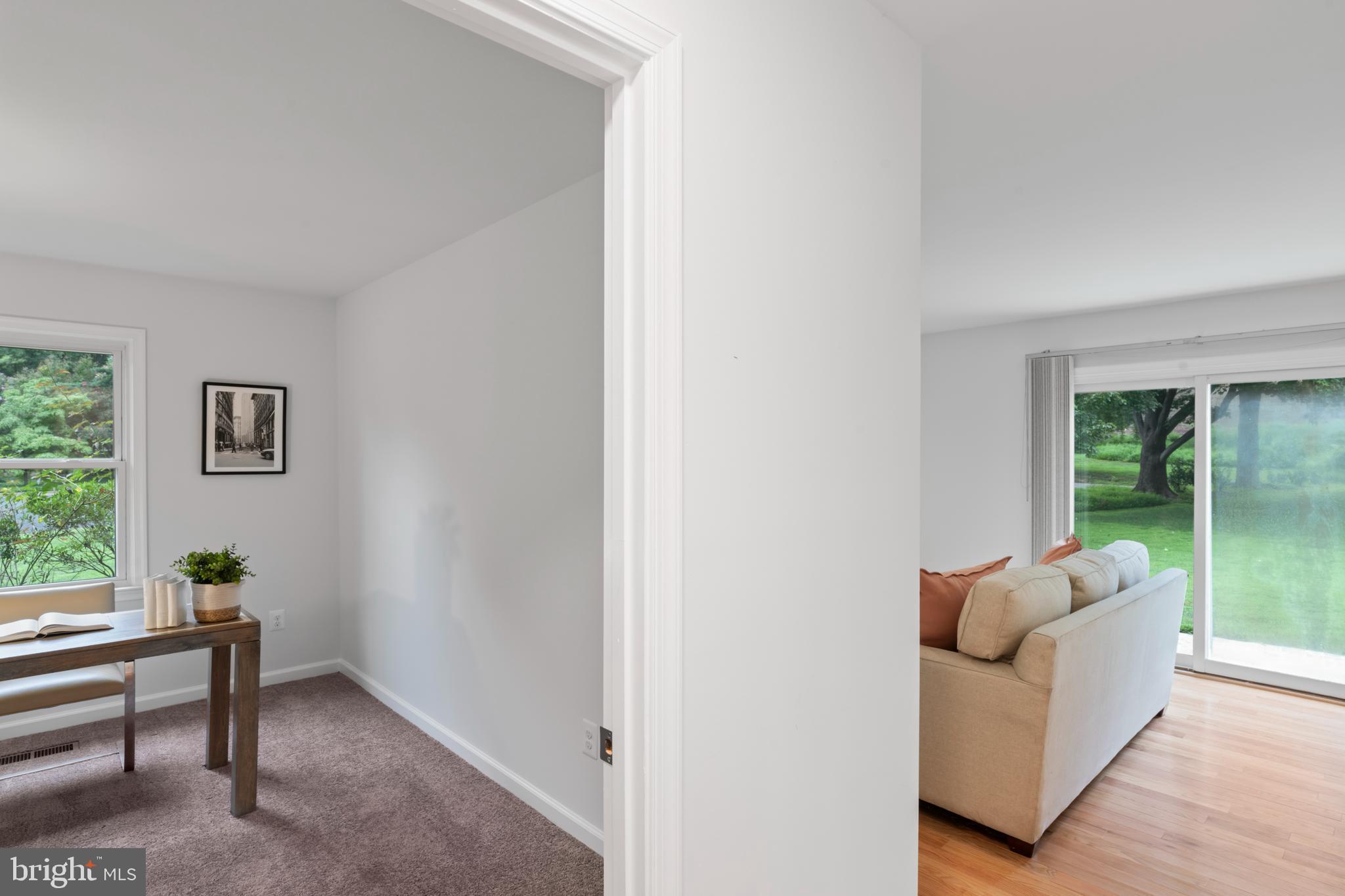 1950 Weybridge Lane Reston, VA 20191 - Photo 29 of 71 a living room with furniture and a window
