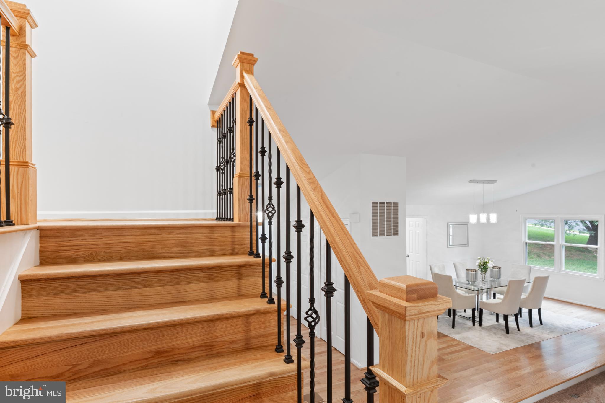 1950 Weybridge Lane Reston, VA 20191 - Photo 35 of 71 a view of entryway and hall with wooden floor