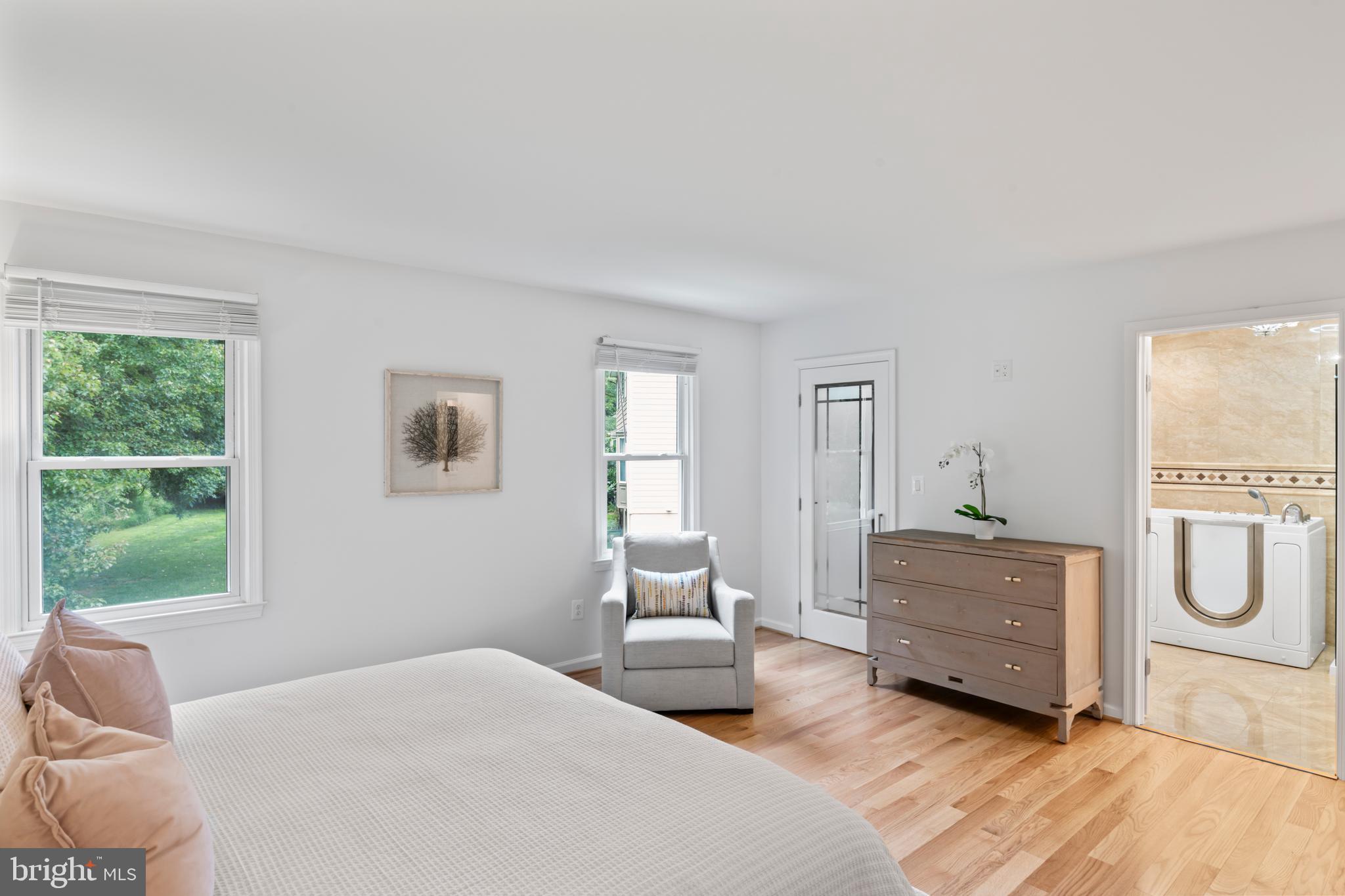 1950 Weybridge Lane Reston, VA 20191 - Photo 39 of 71 a bedroom with a bed and window