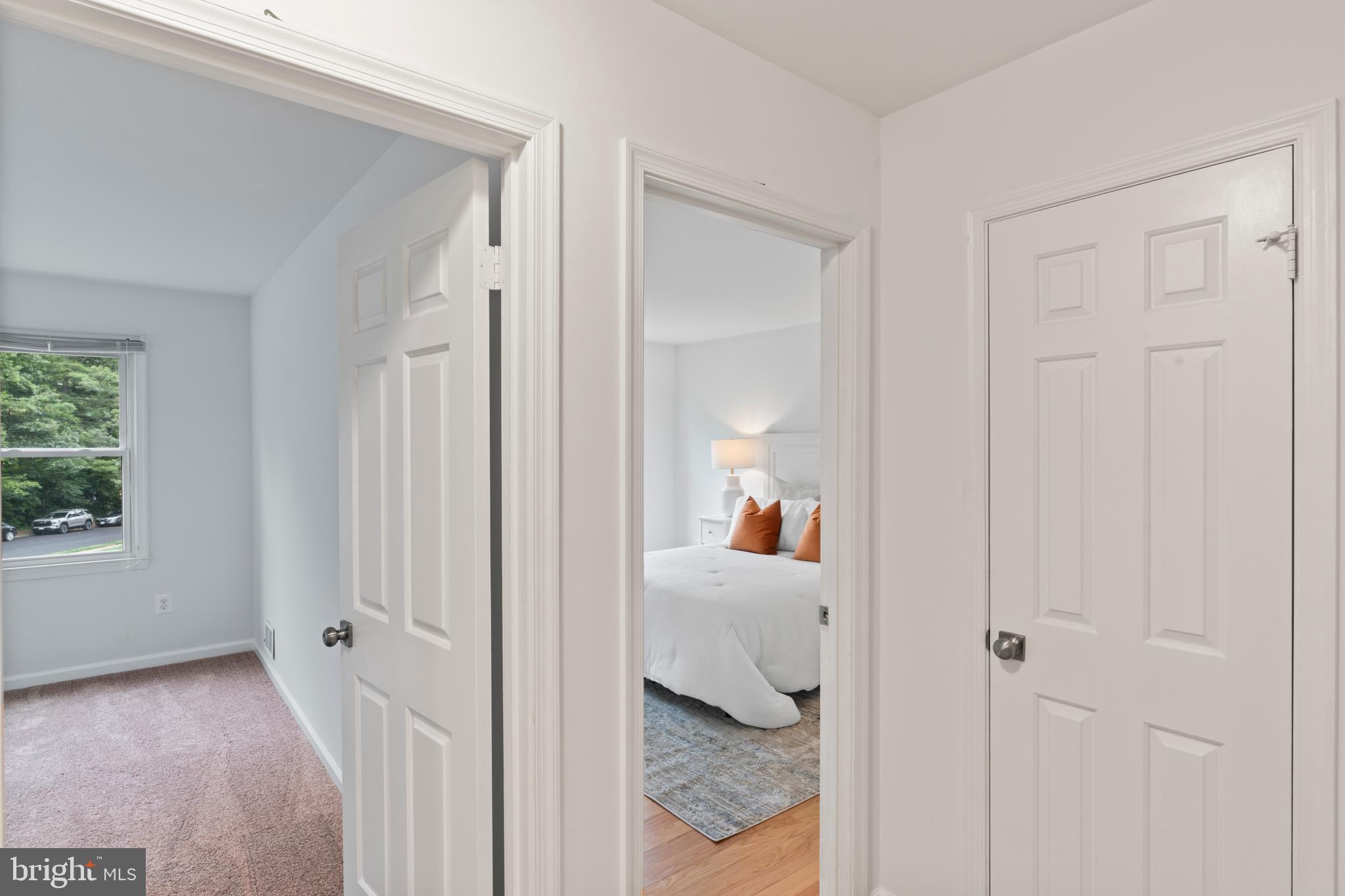 1950 Weybridge Lane Reston, VA 20191 - Photo 44 of 71 a view of a bedroom from the hallway