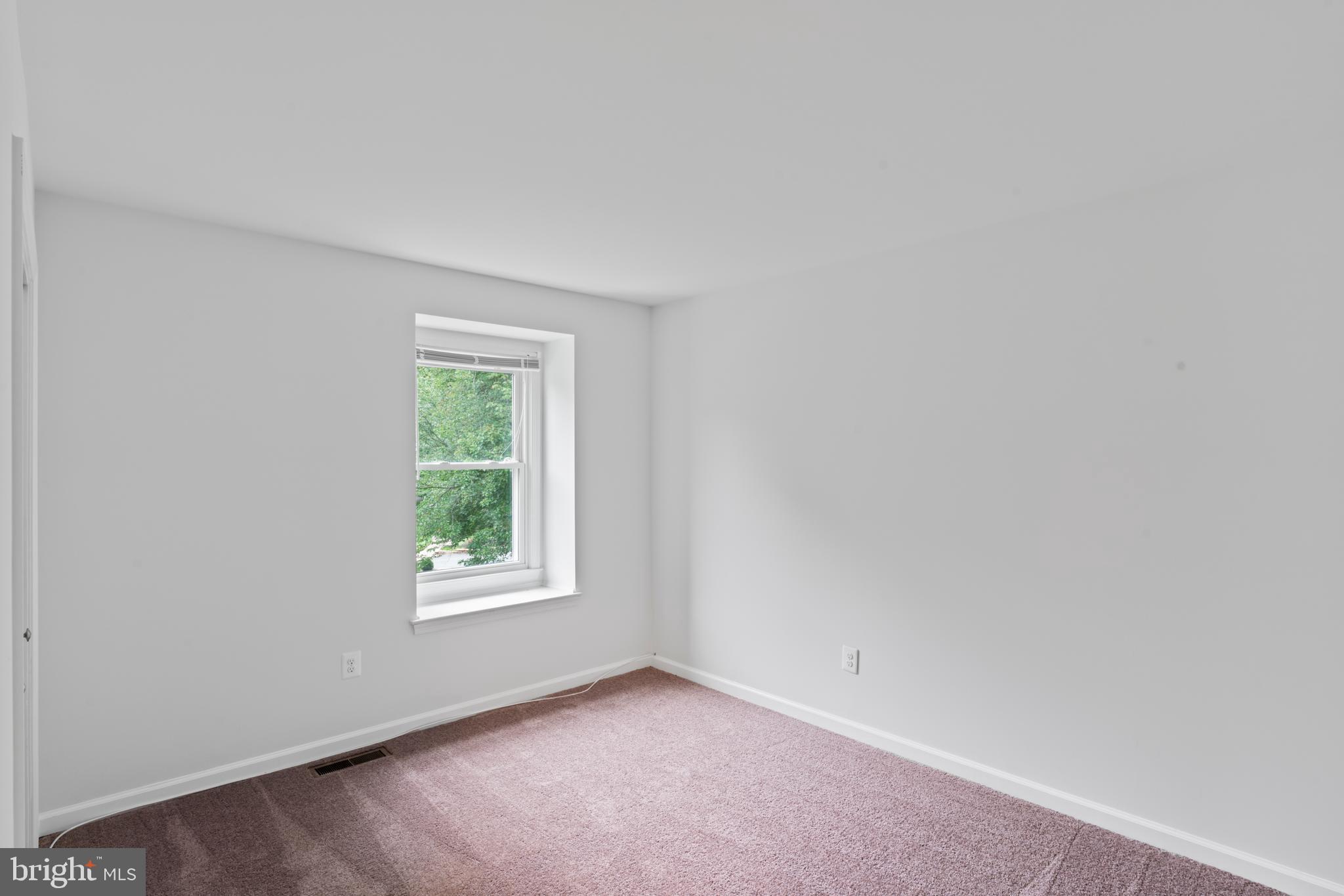 1950 Weybridge Lane Reston, VA 20191 - Photo 51 of 71 an empty room with a window