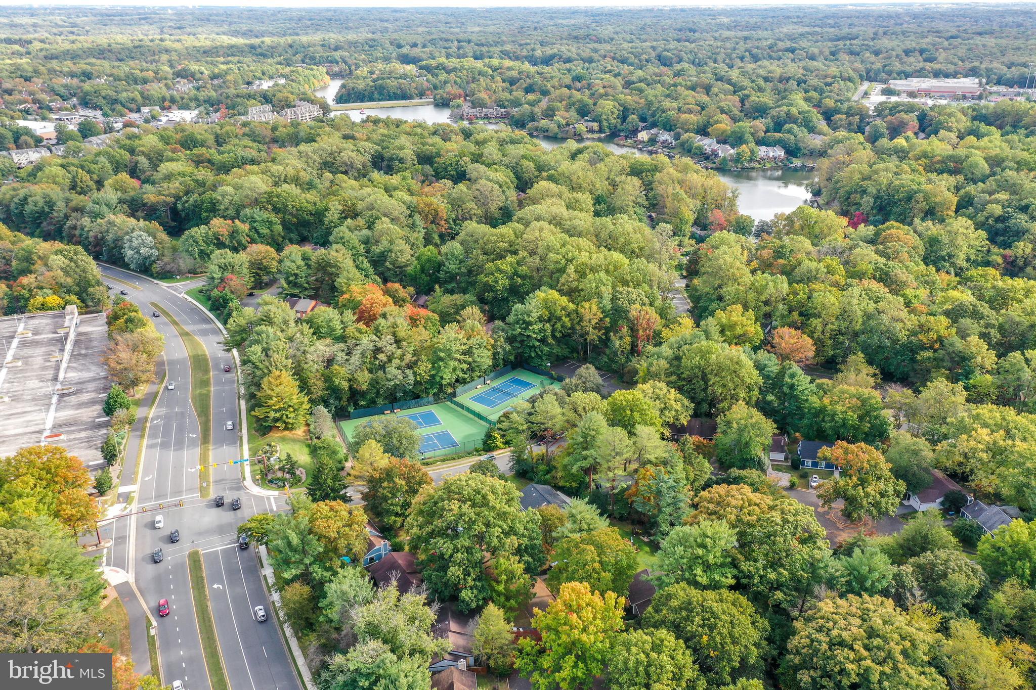 1950 Weybridge Lane Reston, VA 20191 - Photo 65 of 71 an aerial view of a city with lots of residential buildings