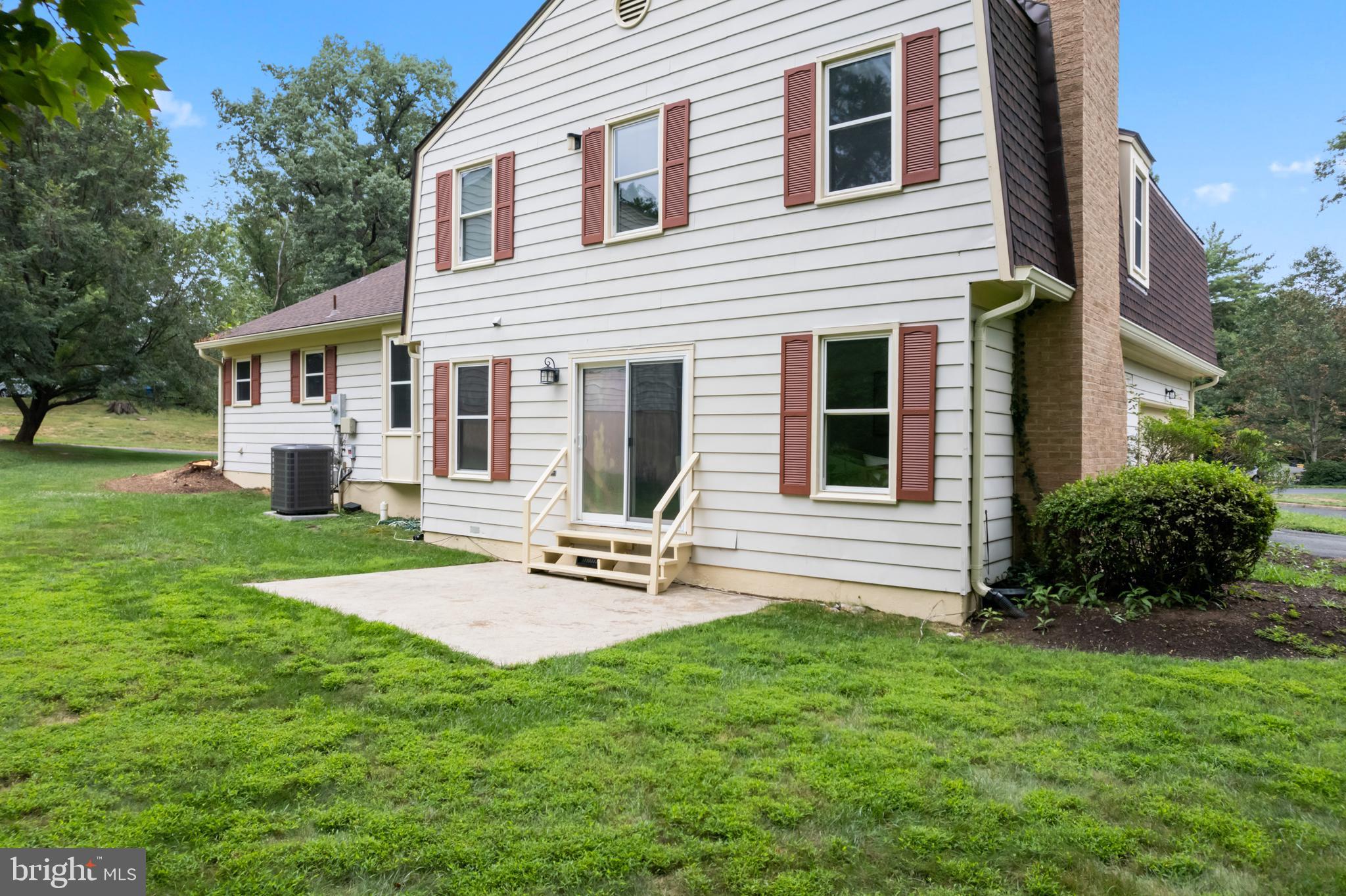 1950 Weybridge Lane Reston, VA 20191 - Photo 8 of 71 a view of house with backyard and a garden