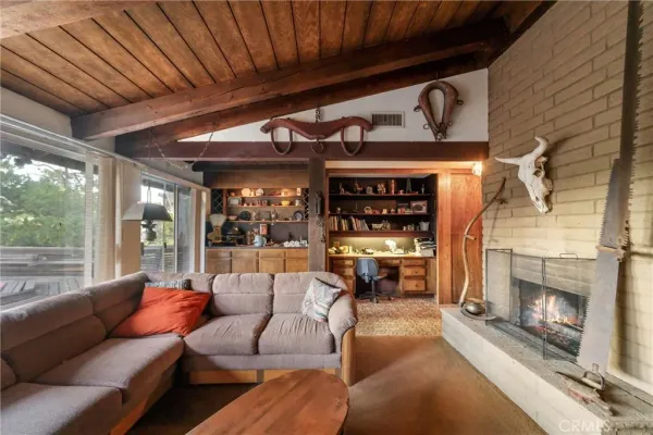 a kitchen with stainless steel appliances granite countertop a refrigerator a stove top oven a sink dishwasher and cabinets