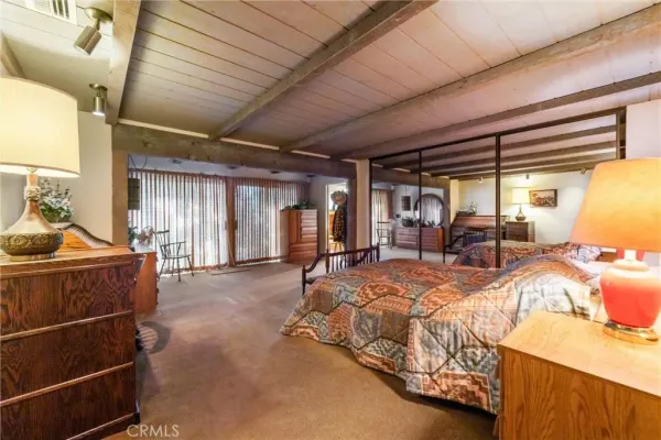 a view of a house with a tree in the background