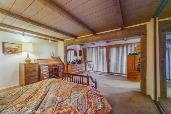 a view of a lake with houses in the back