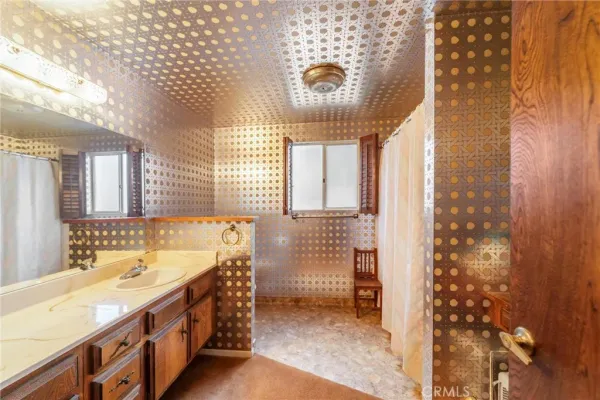 a view of outdoor space with deck and yard