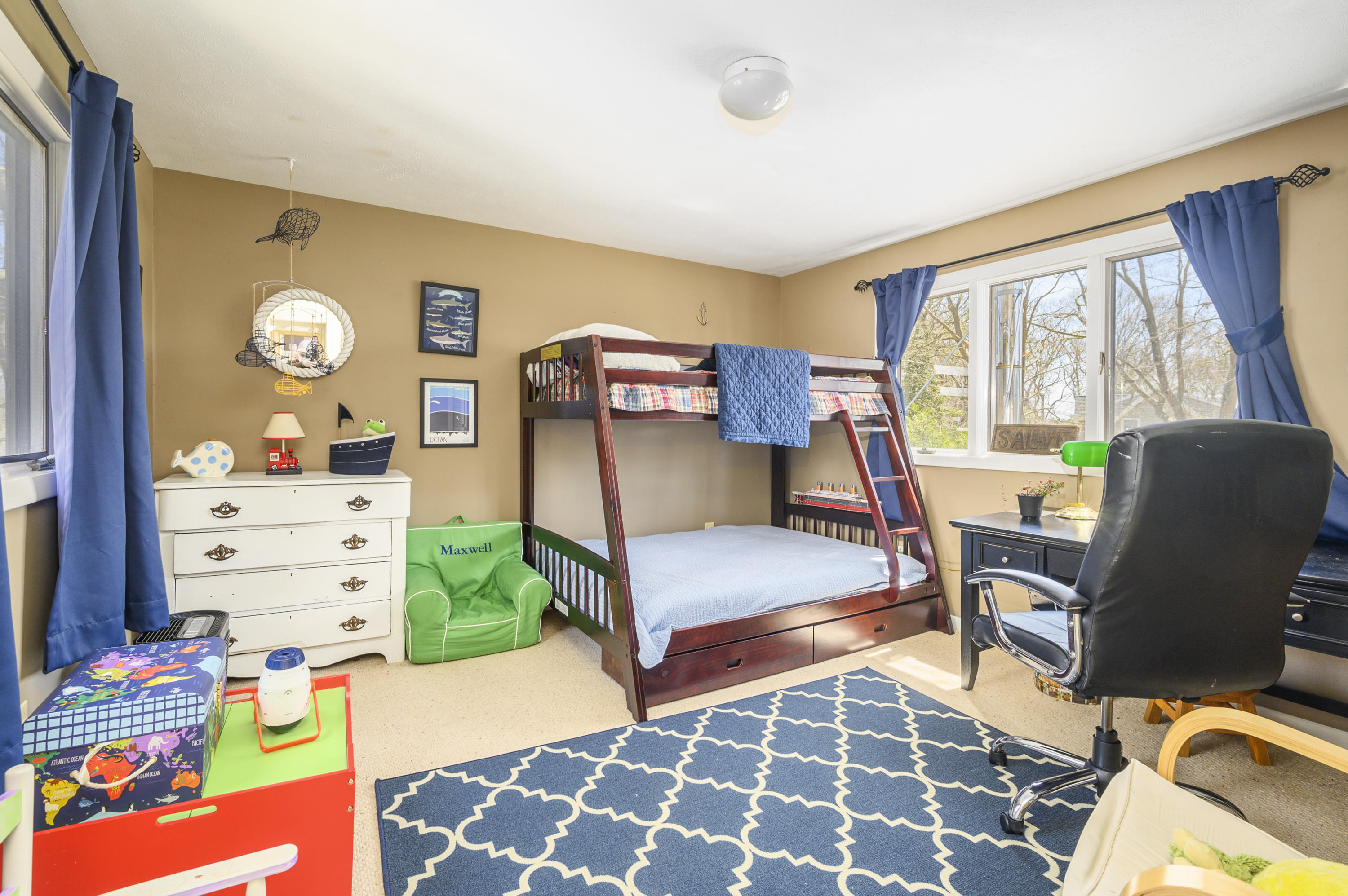 345 Holly Point Road Centerville, MA 02632 - Photo 22 of 28 a bedroom with furniture and a window