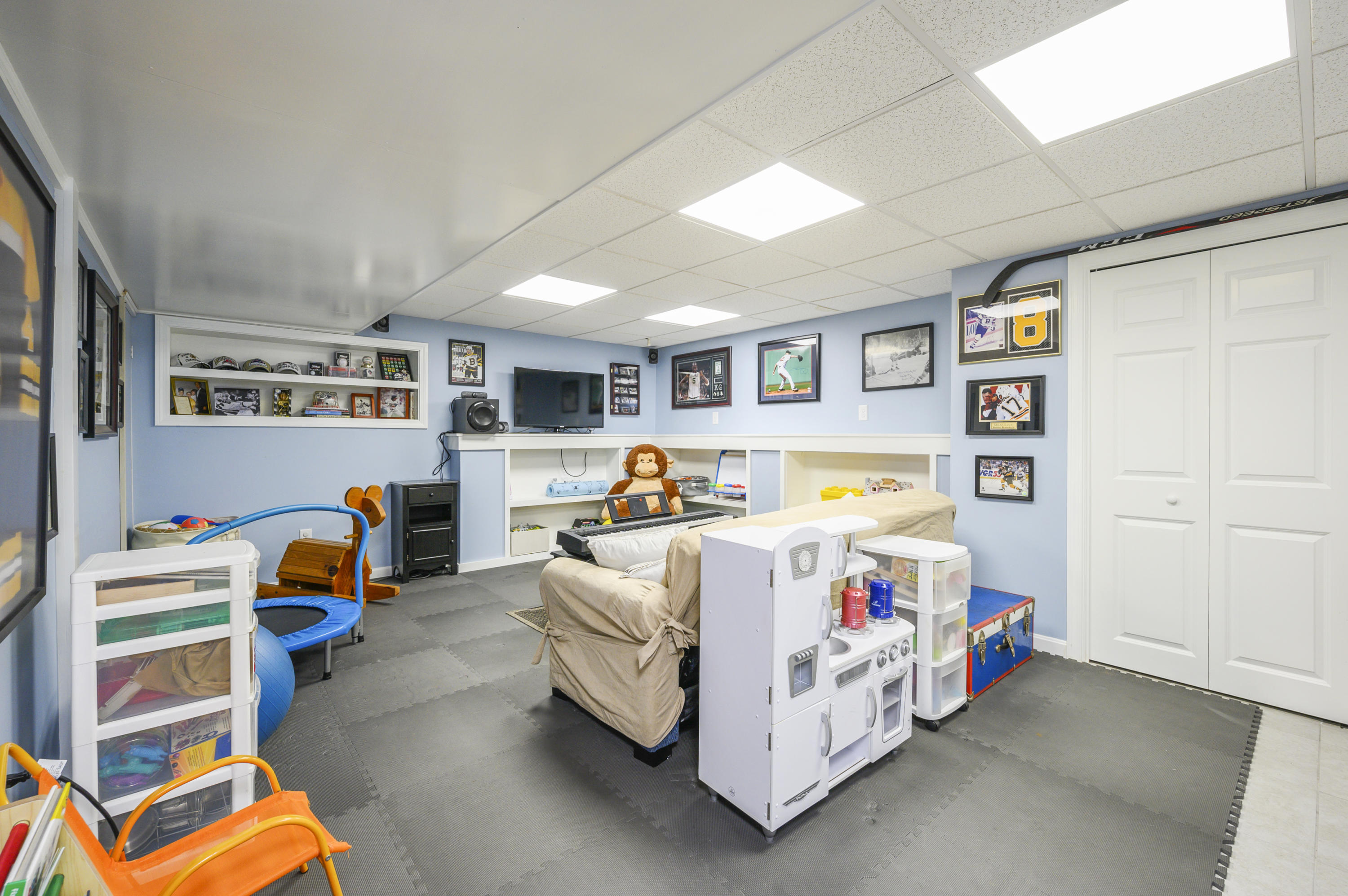 345 Holly Point Road Centerville, MA 02632 - Photo 25 of 28 a bed room with a bed and a chair