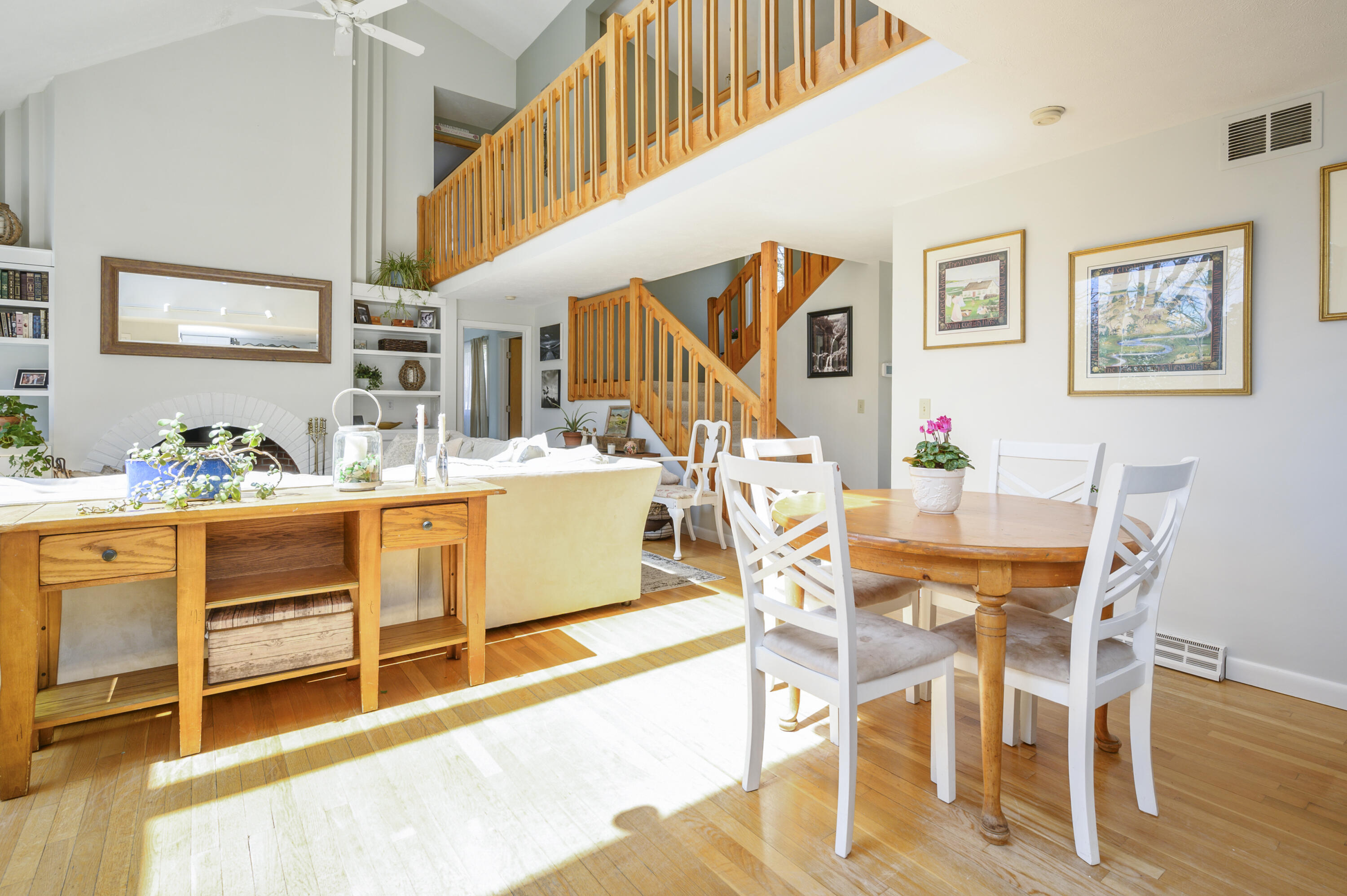 345 Holly Point Road Centerville, MA 02632 - Photo 9 of 28 a view of a dining room with furniture