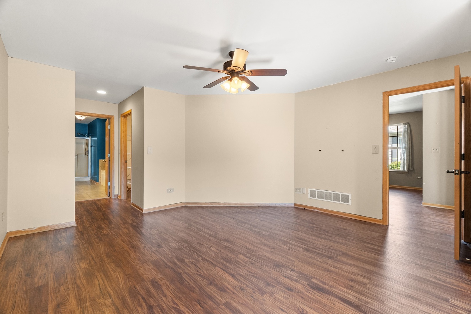 25593 O'Connel Lane Manhattan, IL 60442 - Photo 14 of 24 a view of a room with wooden floor and a ceiling fan