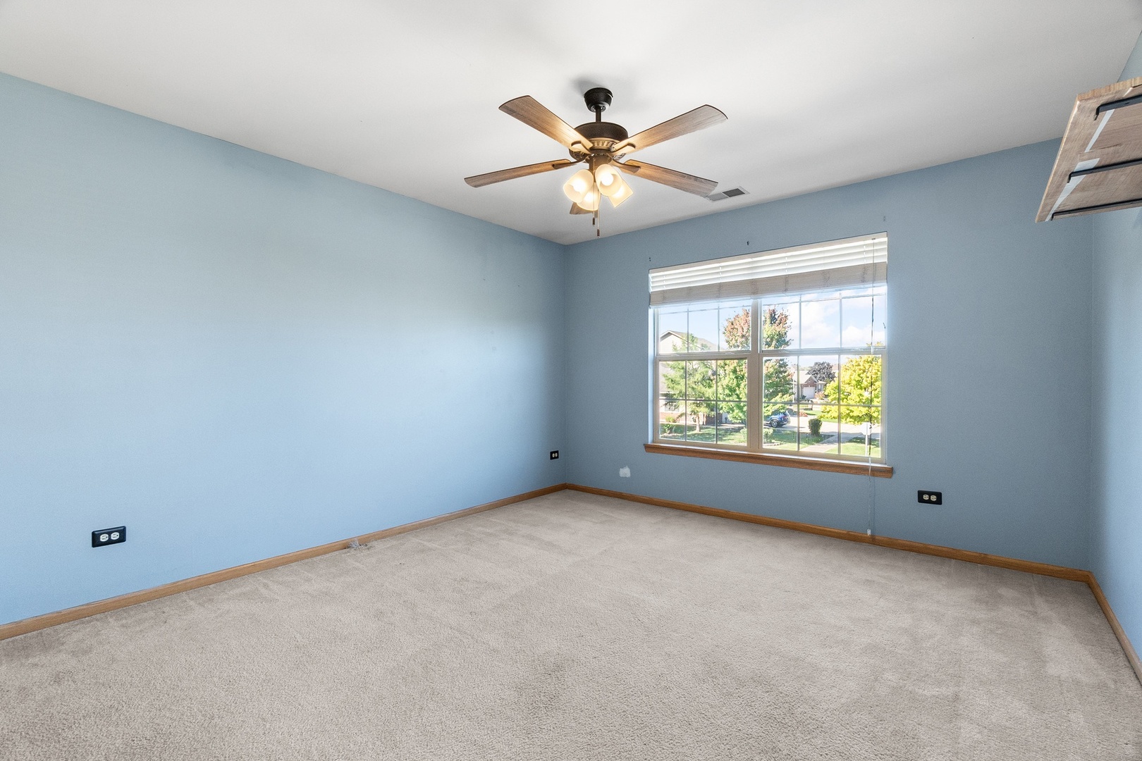 25593 O'Connel Lane Manhattan, IL 60442 - Photo 19 of 24 an empty room with windows and fan