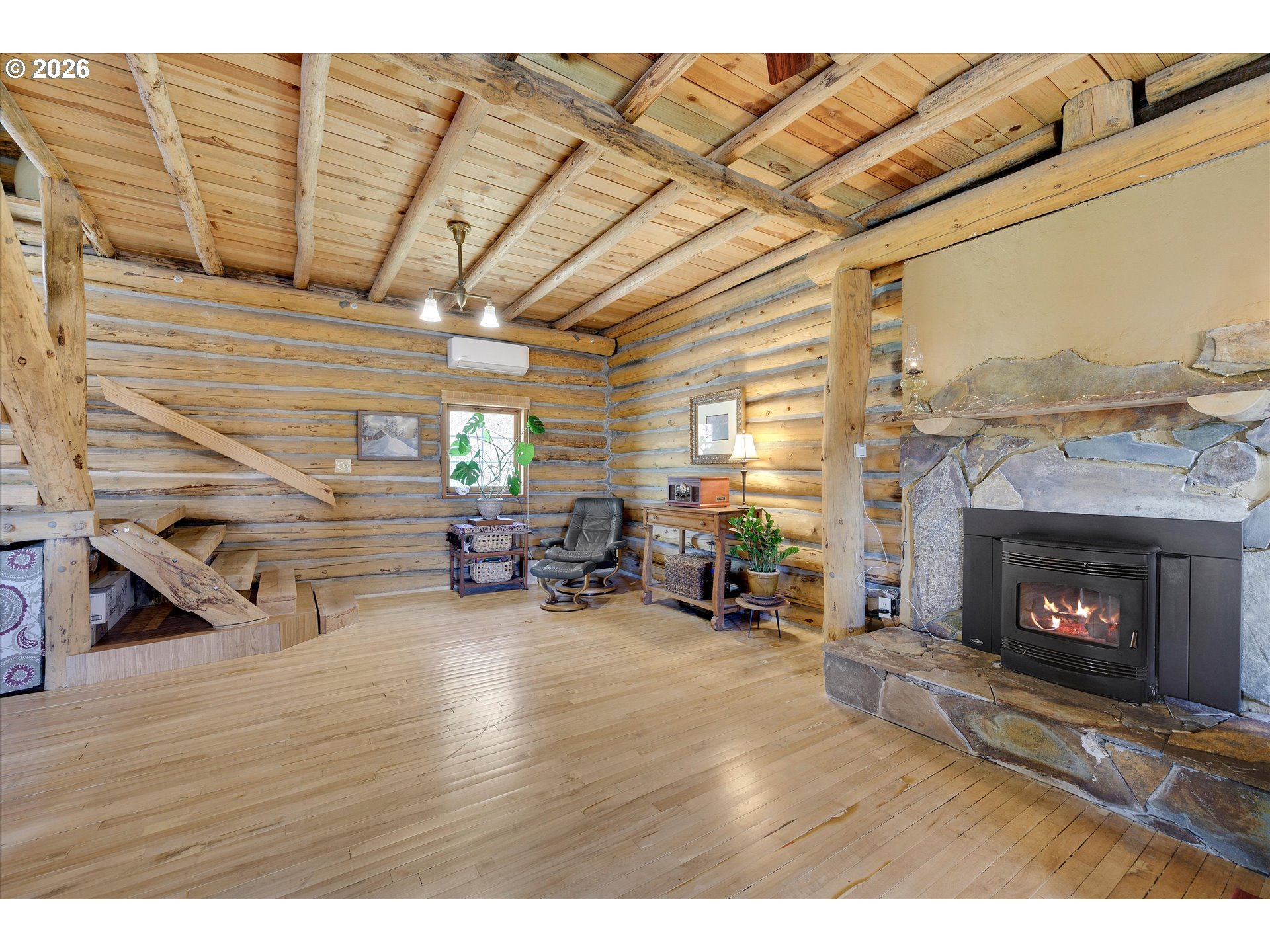 2215 Pine Oak Road Mosier, OR 97040 - Photo 32 of 46 a living room with furniture and a fireplace