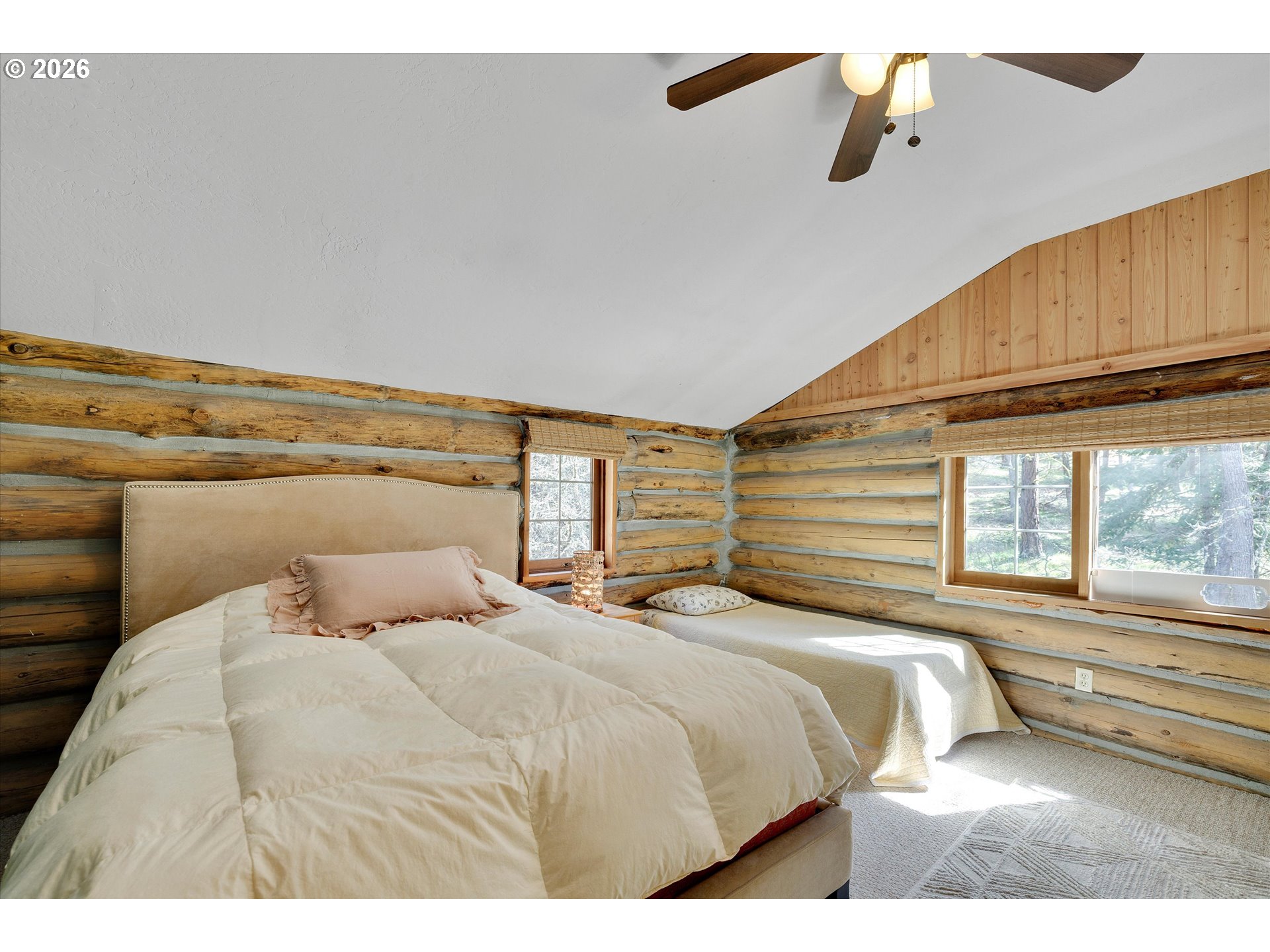 2215 Pine Oak Road Mosier, OR 97040 - Photo 35 of 46 a bedroom with a large bed and a window