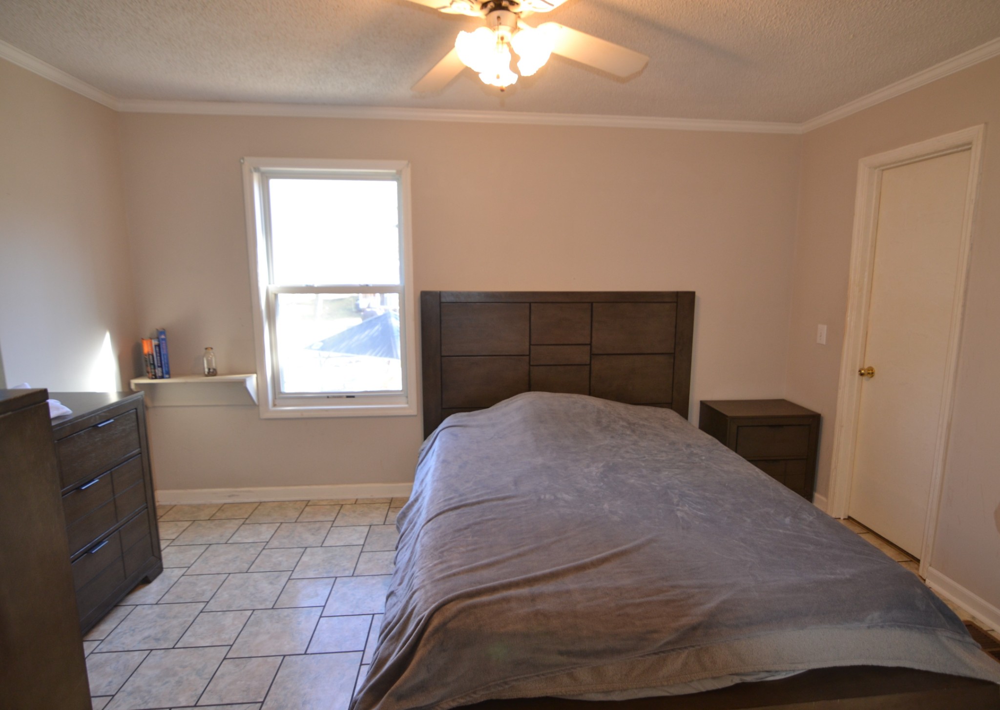 1283 Lake Logan Road Ardmore, TN 38449 - Photo 4 of 8 a bedroom with a bed and a window
