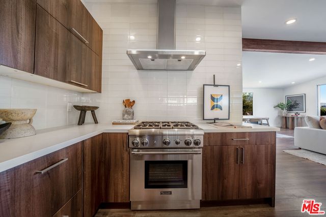 a bedroom with a bed and a mirror