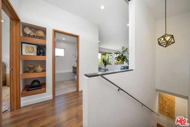 a view of a room with white walls