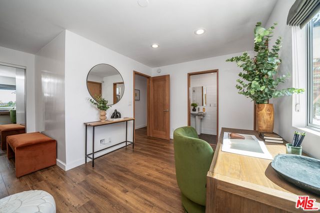 a picture of a wall with a white wall and a refrigerator