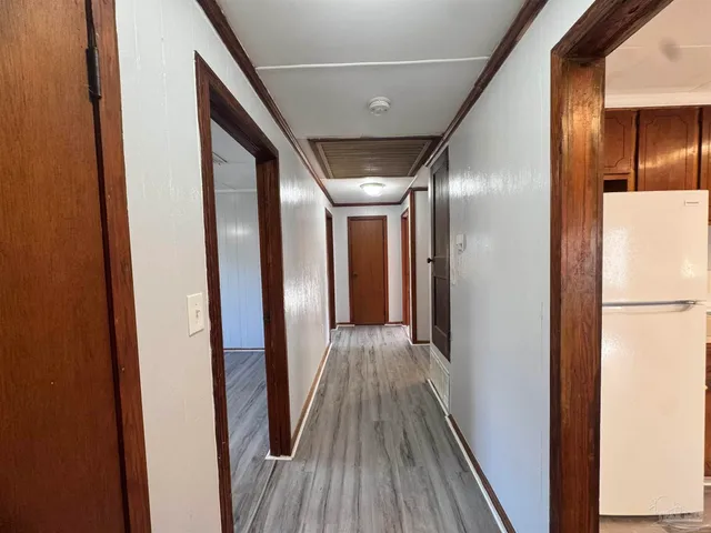 a bathroom with a sink mirror toilet and bathtub