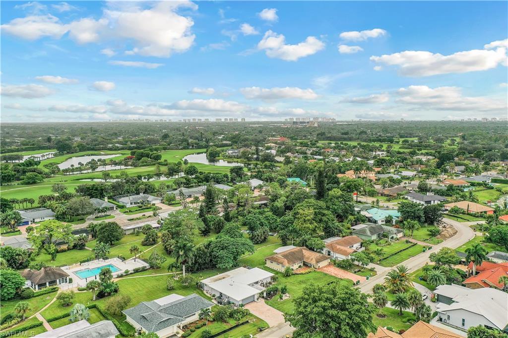 660 Pompano Drive Naples, FL 34110 - Photo 34 of 34 an aerial view of residential houses with outdoor space and street view
