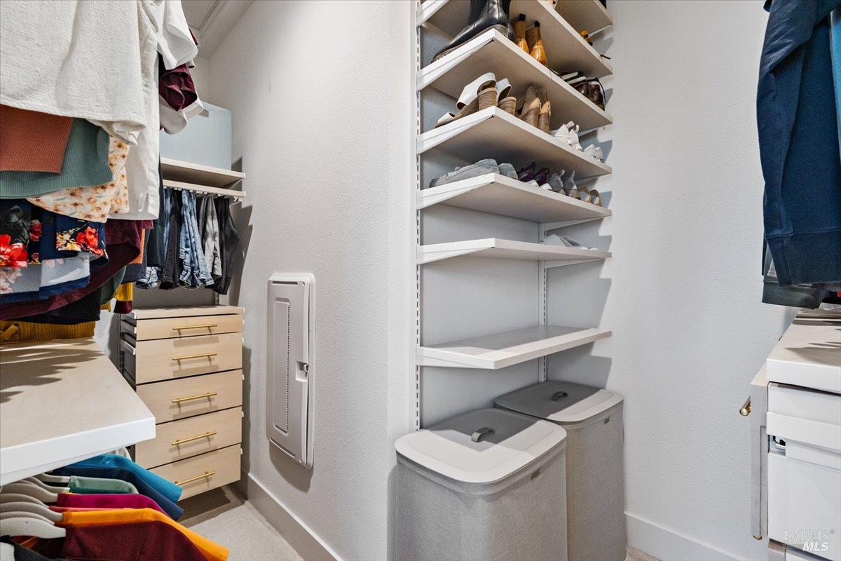 649 Semillon Lane Santa Rosa, CA 95403 - Photo 23 of 38 Custom walk-in closet organization system maximizes storage and functionality.