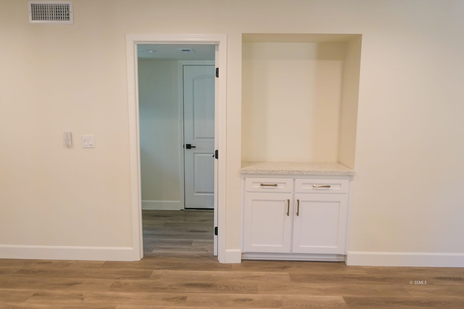 736 West Howell Avenue Ridgecrest, CA 93555 - Photo 13 of 50 an empty room with wooden floor and closet