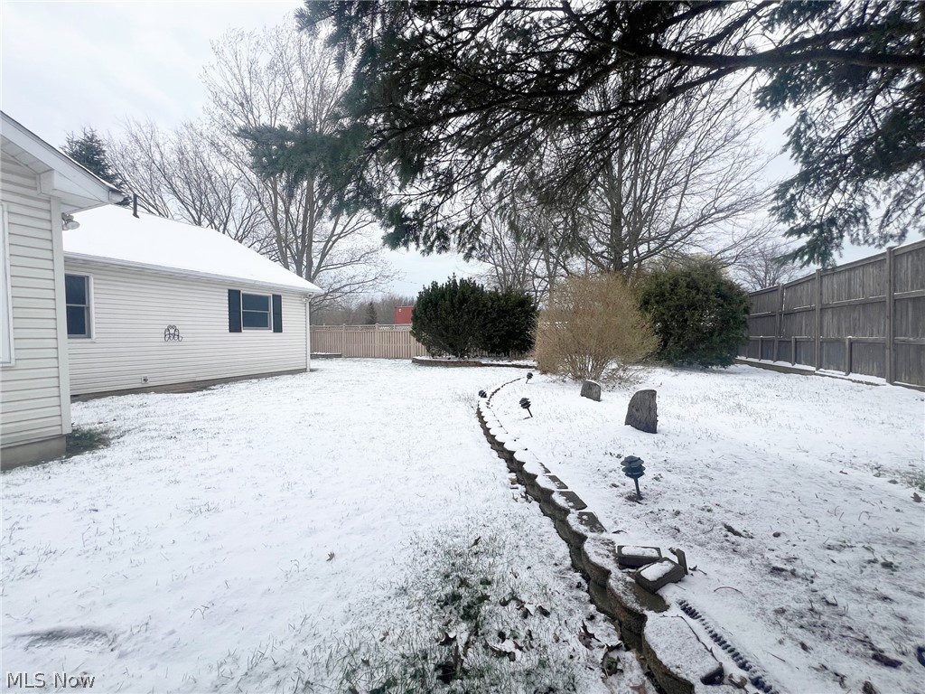 5203 Ridgeland Street Lorain, OH 44055 - Photo 35 of 39 View of snowy yard