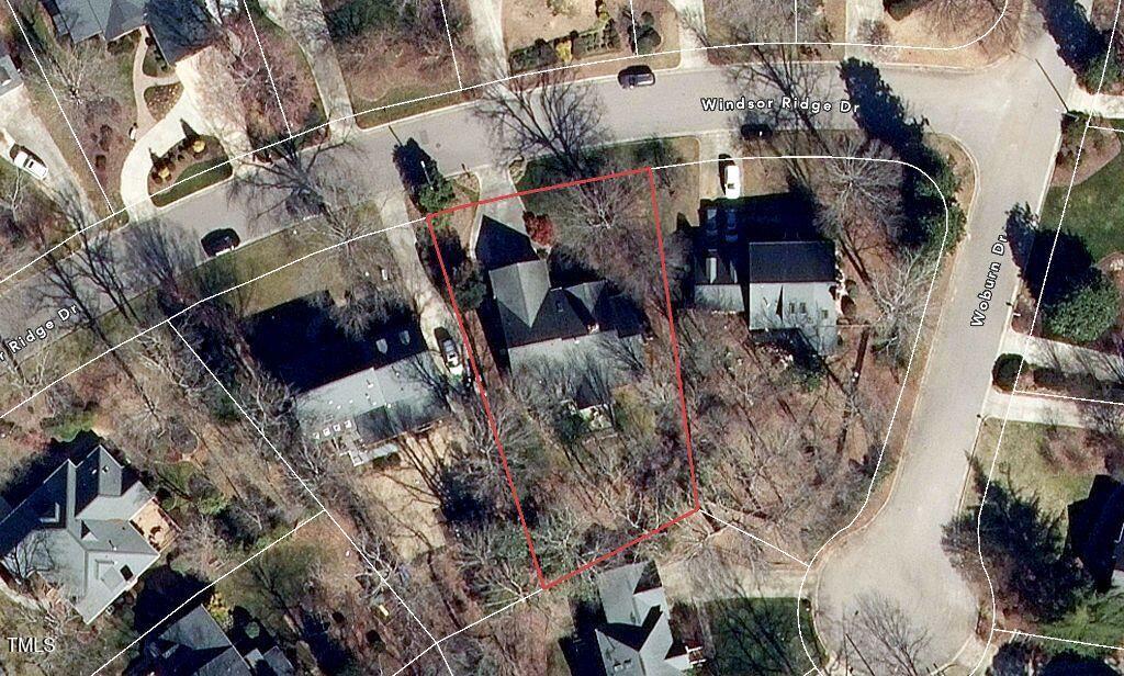8116 Windsor Ridge Drive Raleigh, NC 27615 - Photo 53 of 54 an aerial view of a house with a yard