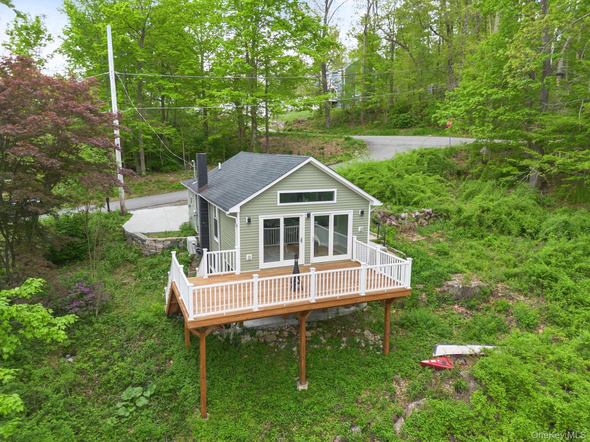 a house with trees in the background