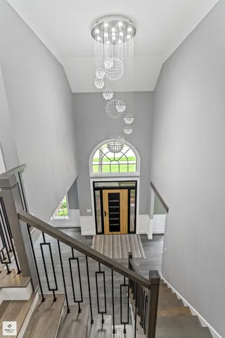 a view of a livingroom with furniture chandelier