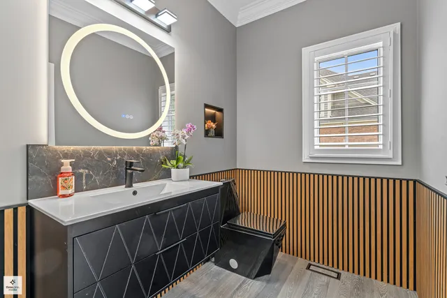 a bathroom with a sink and a mirror