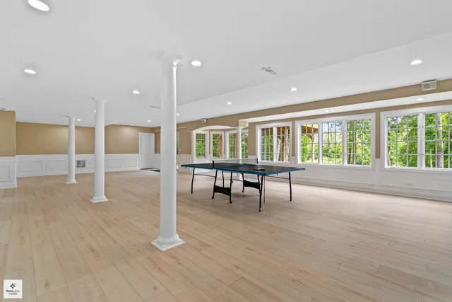 a view of workspace with furniture and window