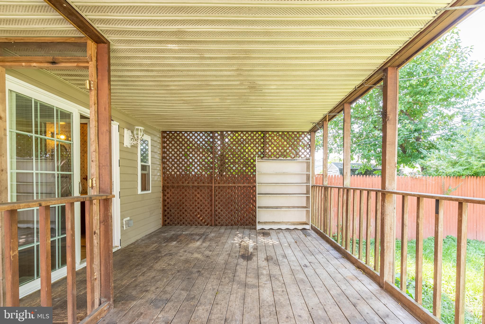 815 Fairview Road Swarthmore, PA 19081 - Photo 22 of 25 a view of a balcony with wooden floor and iron stairs