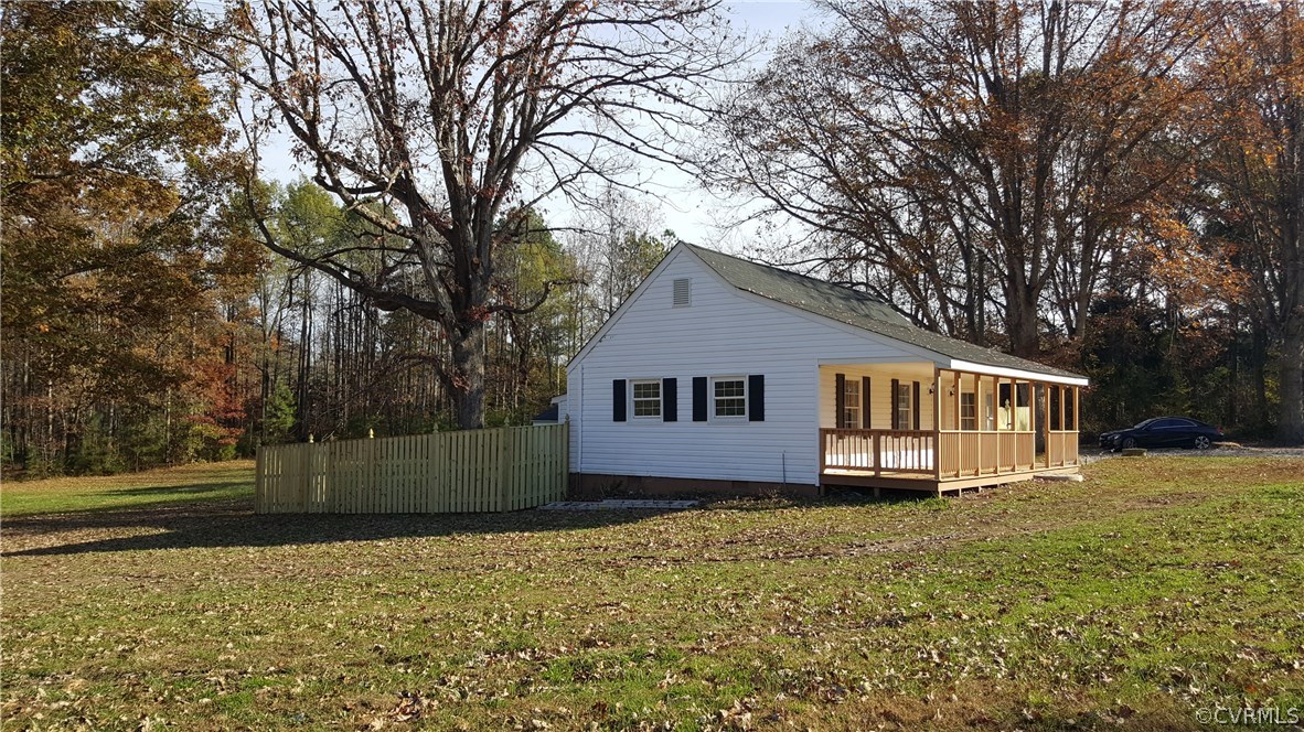 15024 Beach Road Chesterfield, VA 23832 - Photo 15 of 20 a house with trees in the background