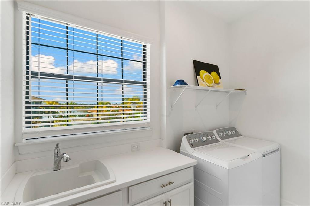 9633 Montelanico Loop, Unit 203 Naples, FL 34119 - Photo 25 of 33 a bathroom with a sink and a bathtub