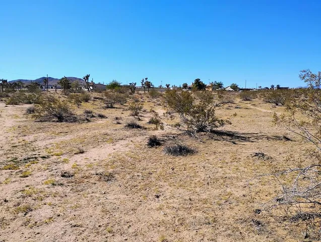 a view of ocean and mountain