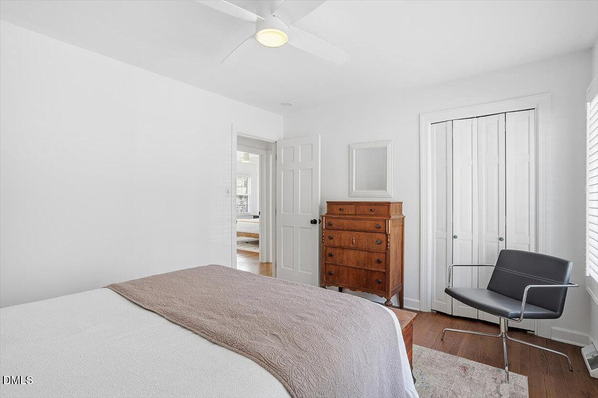 5904 Volant Drive Raleigh, NC 27609 - Photo 28 of 42 a bedroom with a bed and a closet