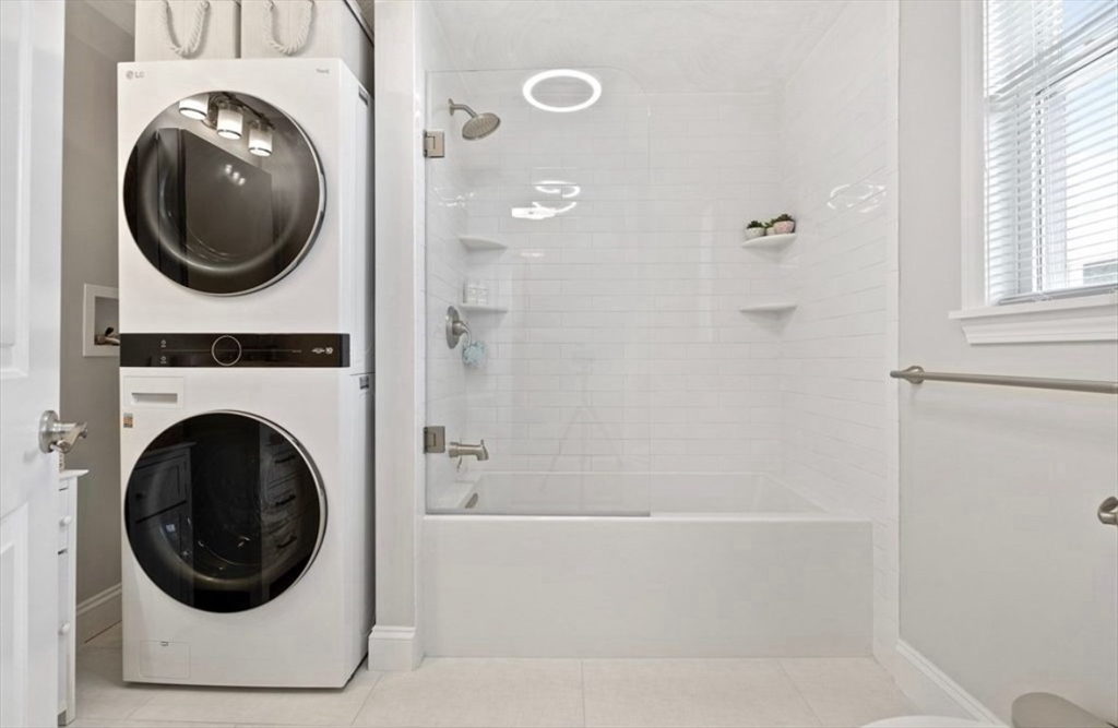 41 Boardman Street, Unit 2 Boston, MA 02128 - Photo 5 of 10 a bathroom with a toilet and a sink