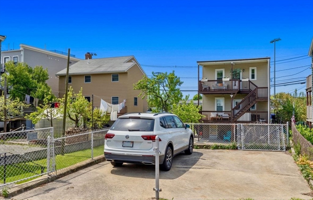 41 Boardman Street, Unit 2 Boston, MA 02128 - Photo 10 of 10 a view of a house with backyard and sitting area