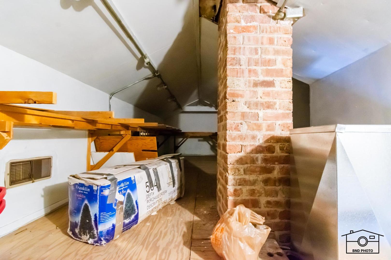 17617 Washington Avenue Homewood, IL 60430 - Photo 16 of 16 a view of walk in closet with clothes and shoes