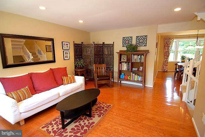 173 West Annandale Road Falls Church, VA 22046 - Photo 2 of 25 a living room with furniture and dresser with wooden floor