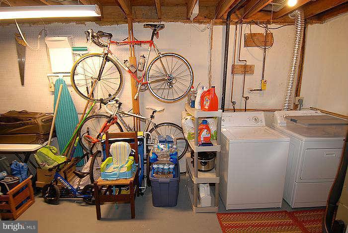 173 West Annandale Road Falls Church, VA 22046 - Photo 18 of 25 a view of storage and utility room with washer and dryer