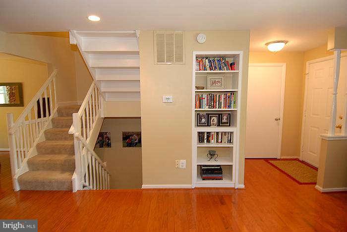 173 West Annandale Road Falls Church, VA 22046 - Photo 3 of 25 a view of a livingroom with furniture and staircase