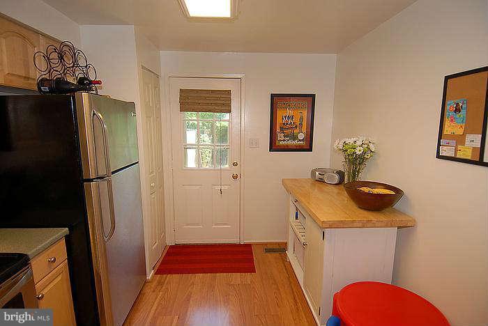 173 West Annandale Road Falls Church, VA 22046 - Photo 7 of 25 a bathroom with a sink a toilet and shower