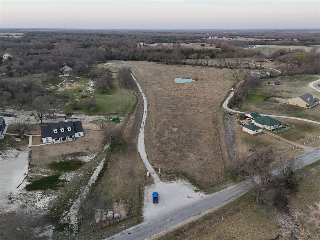 3891 Bethel-Cannon Road Van Alstyne, TX 75495 - Photo 3 of 16 an aerial view of a house with a yard