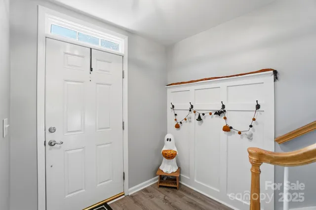 a bed room with a bed and a window