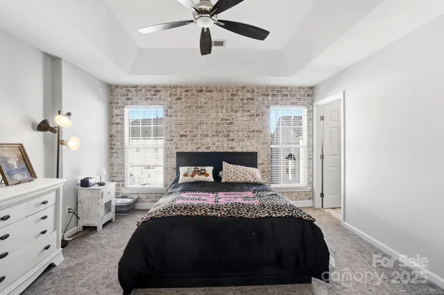 a bedroom with a bed and a cabinets