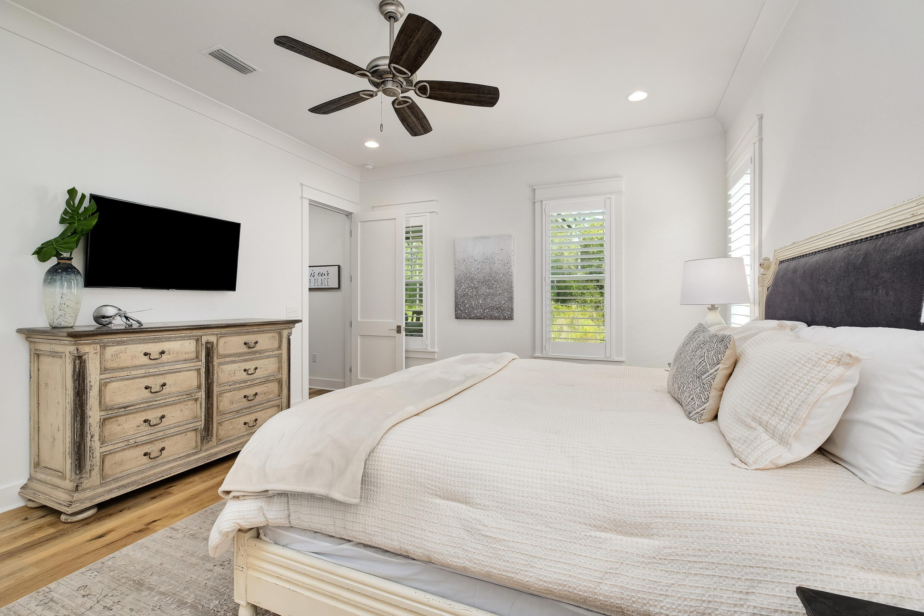 161 Sidecamp Rd Inlet Beach Inlet Beach, FL 32461 - Photo 18 of 66 a bedroom with a large bed and a flat screen tv