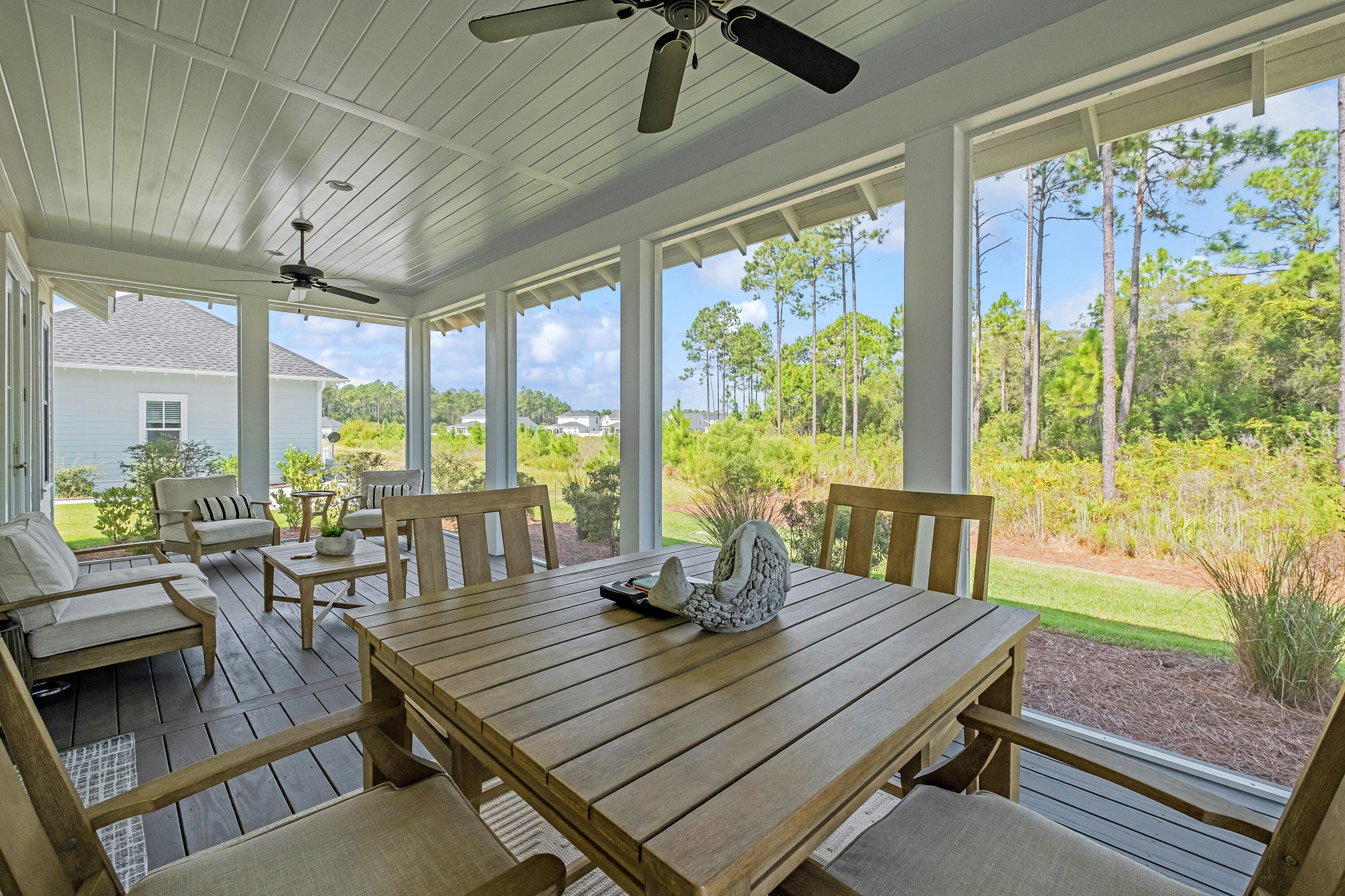 161 Sidecamp Rd Inlet Beach Inlet Beach, FL 32461 - Photo 44 of 66 a view of a dining room with furniture window and outside view